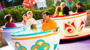 people riding in the tea cups at Mad Tea Party at Disneyland in Los Angeles, California, USA